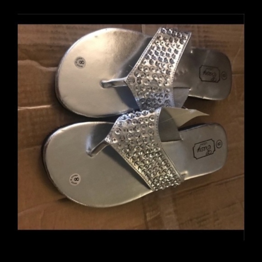Silver rhinestone flip flops​